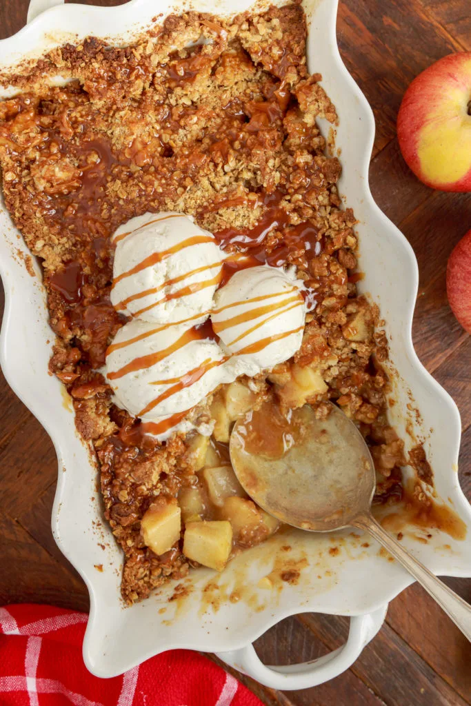 Caramel sauce drizzled over crisp and ice cream.