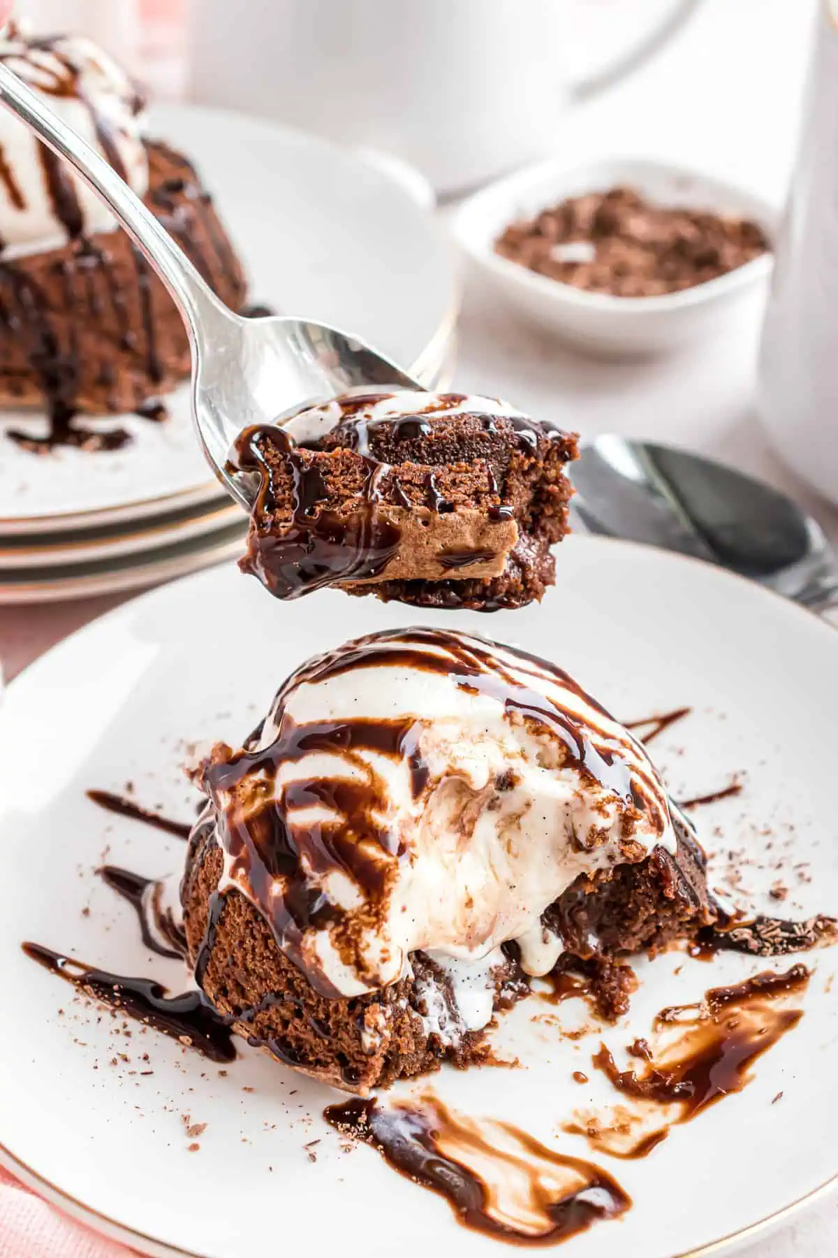 Bite of lava cake on a spoon.