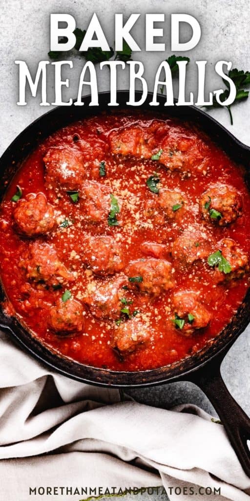 Top down view of a pan of baked meatballs.