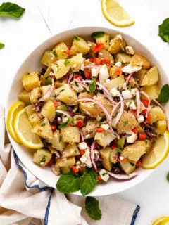 Greek potato salad in a serving dish.
