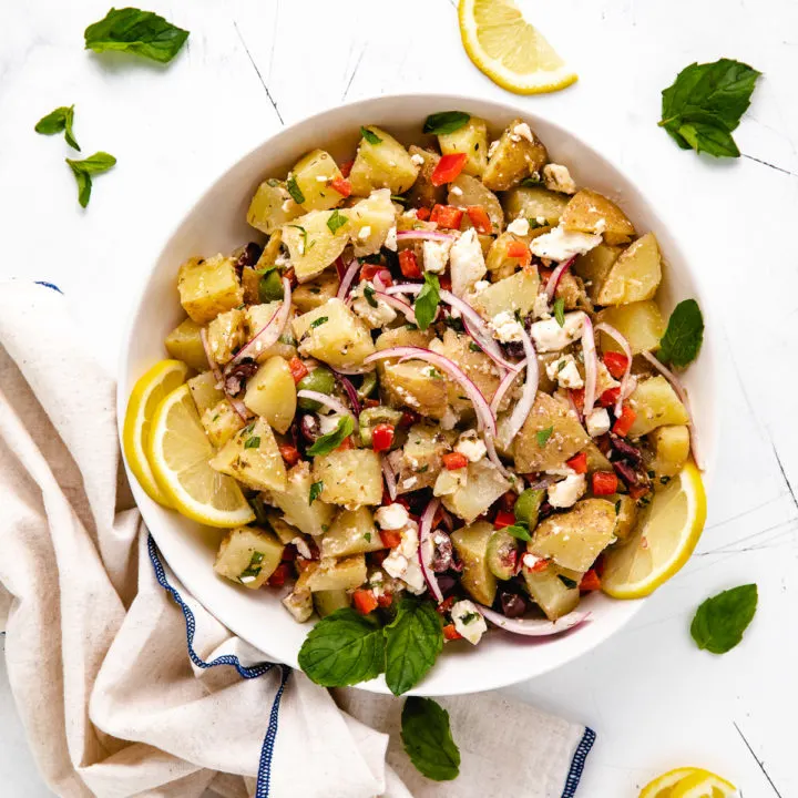 Greek potato salad in a serving dish.