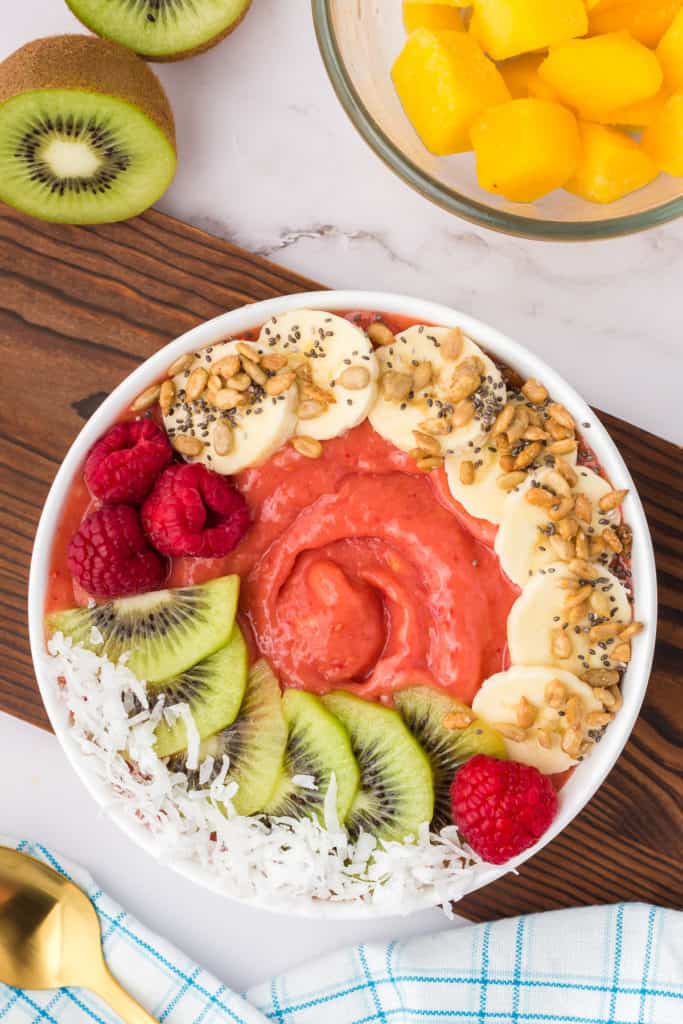 Top down view of fruit on a smoothie bowl.