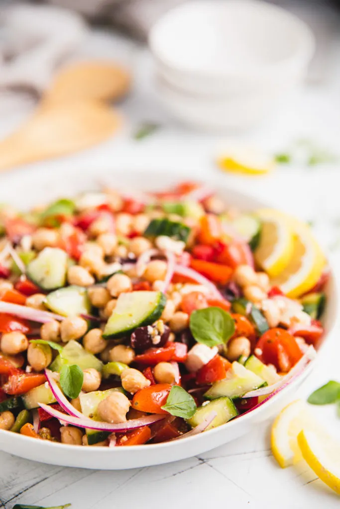 Side view of greek mediterranean salad in a bowl.