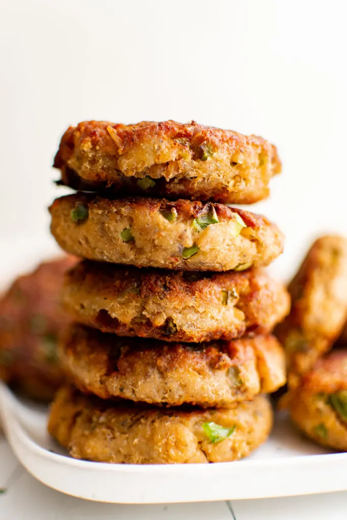 Stack of several salmon croquettes.