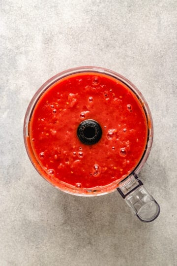 Processed tomatoes in a food processor.