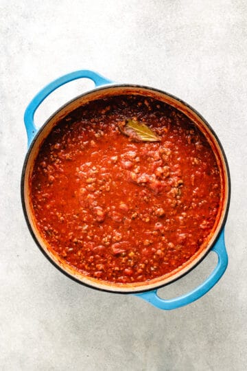 Meat sauce cooking in a pan.
