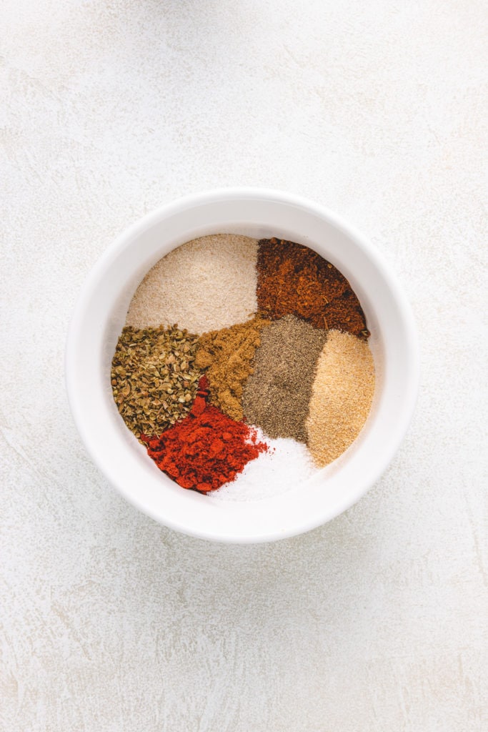 Ingredients for taco seasoning in a bowl.