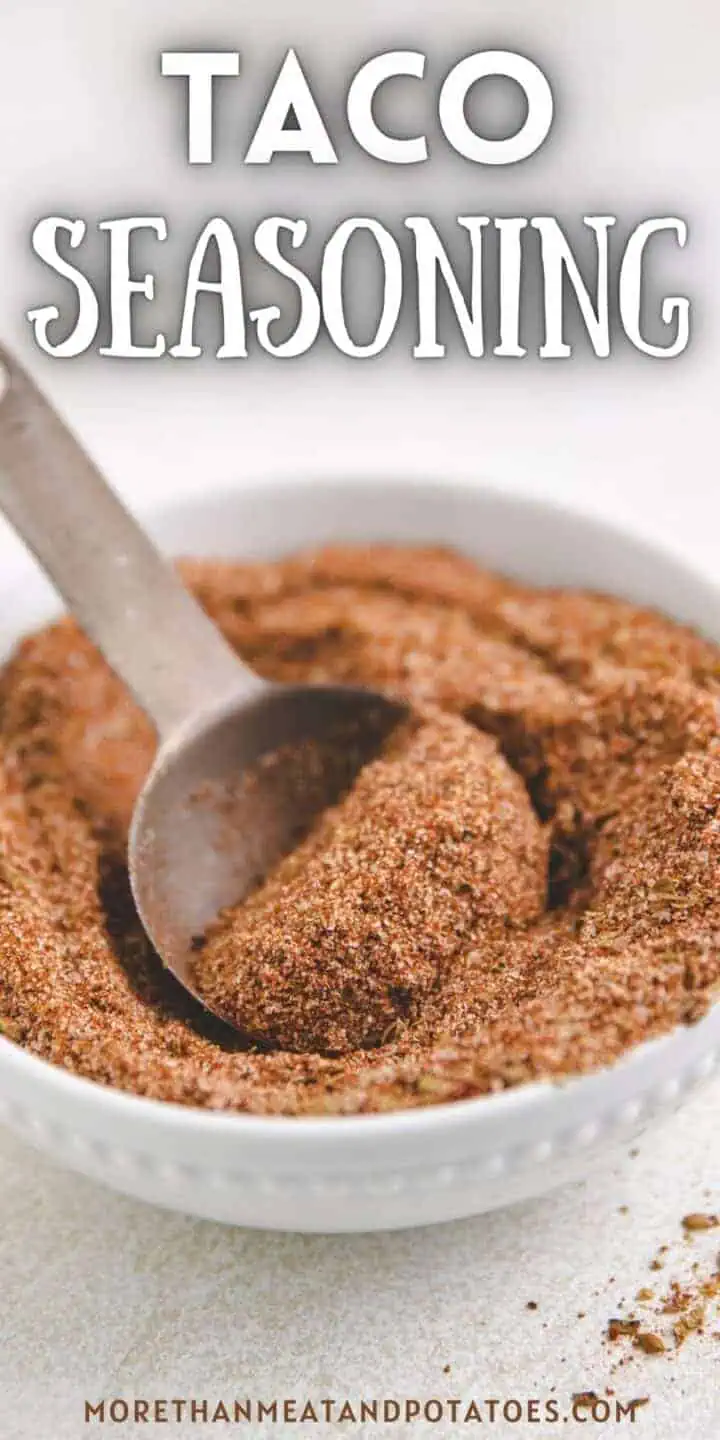 Close up view of taco seasoning in a white dish.