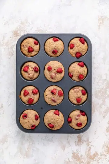 Baked muffins in a muffin pan.