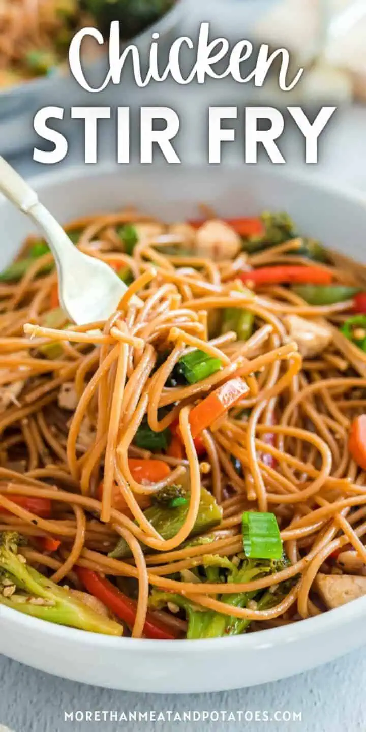 Close up photo of chicken stir fry in a bowl.