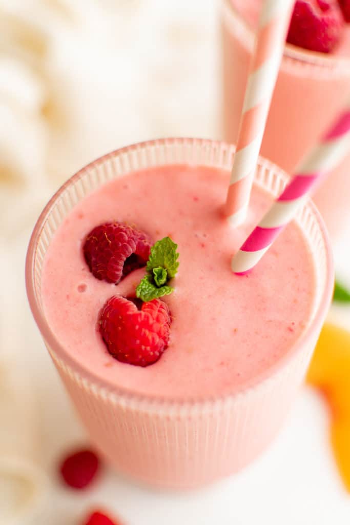 Top down view of fresh fruit on a smoothie.