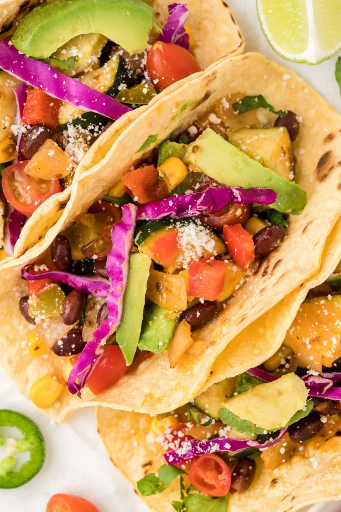 Close up view of veggie tacos.