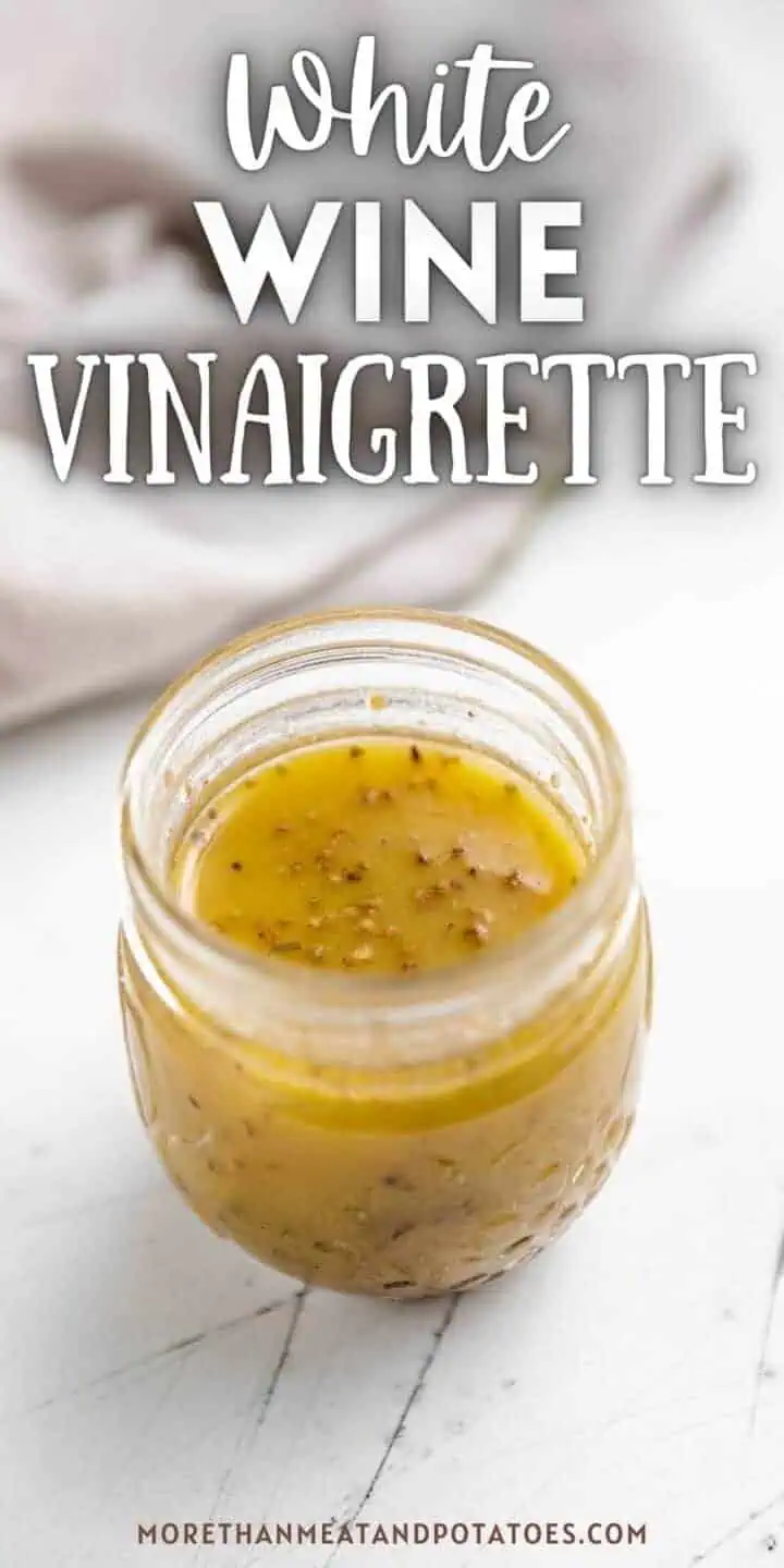 White wine vinaigrette in a glass jar.