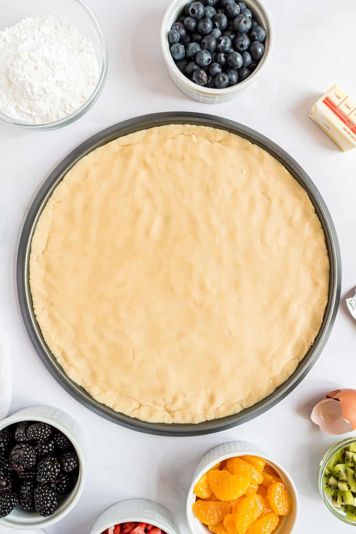 Baked cookie crust on a pan.