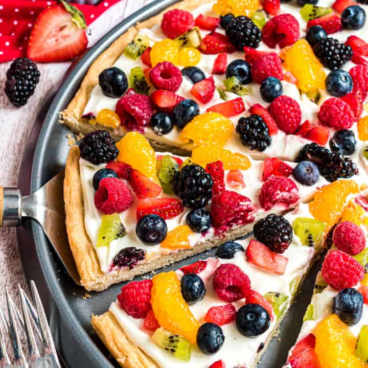 Sugar cookie crust topped with fruit.