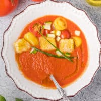 Bowl of gazpacho with croutons.