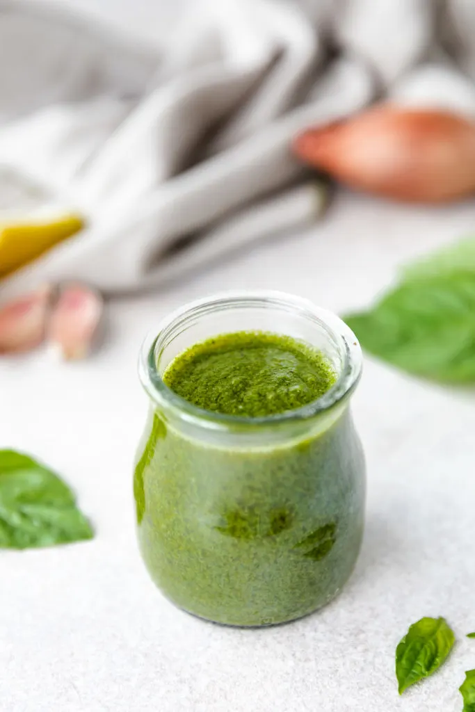 Jar of herb vinaigrette.