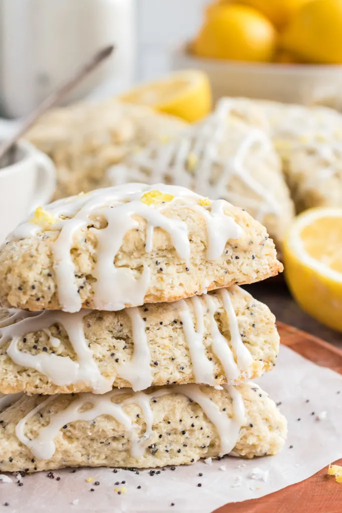 Four lemon scones stacked.