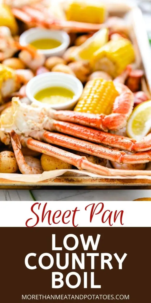 Close up view of sheet pan low country boil with crab legs.