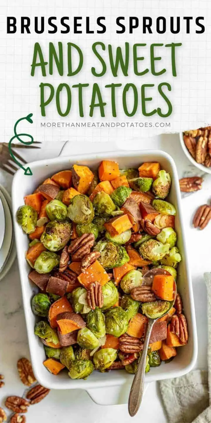 Close up view of roasted brussels sprouts and sweet potatoes in a pan.