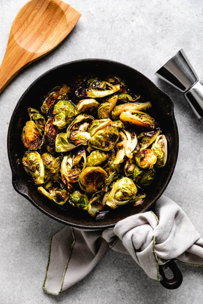 Top down view of brussel sprouts in a pan.