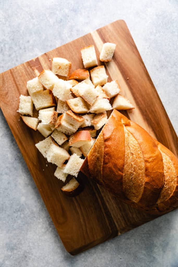 Loaf of bread on a cutting board.