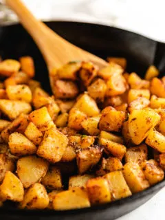 Pan of seasoned breakfast potatoes.