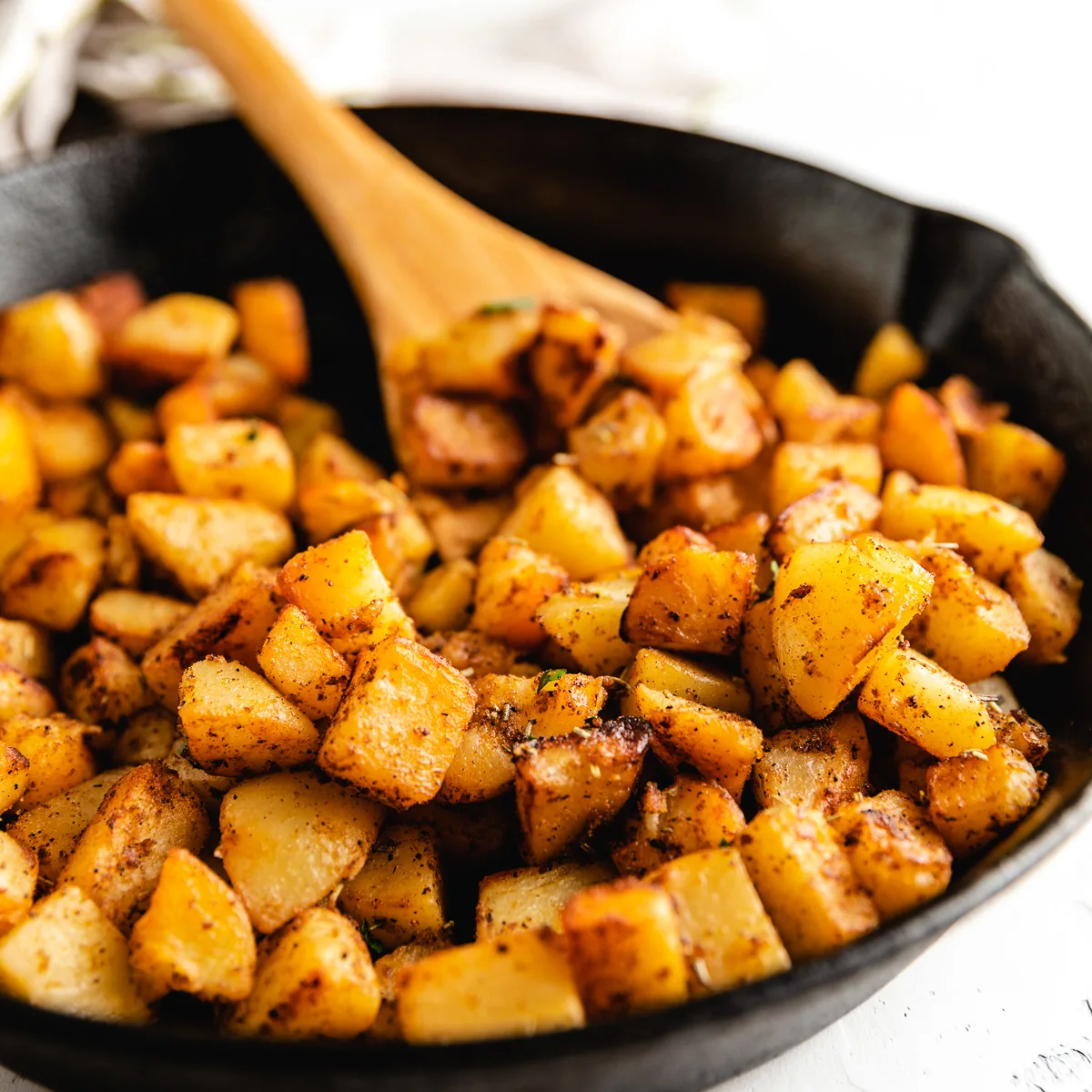 Pan of seasoned breakfast potatoes.