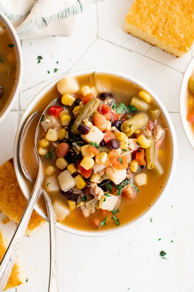 Top down view of soup in a dish.