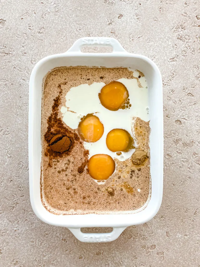 Ingredients for egg batter for toast in a dish.