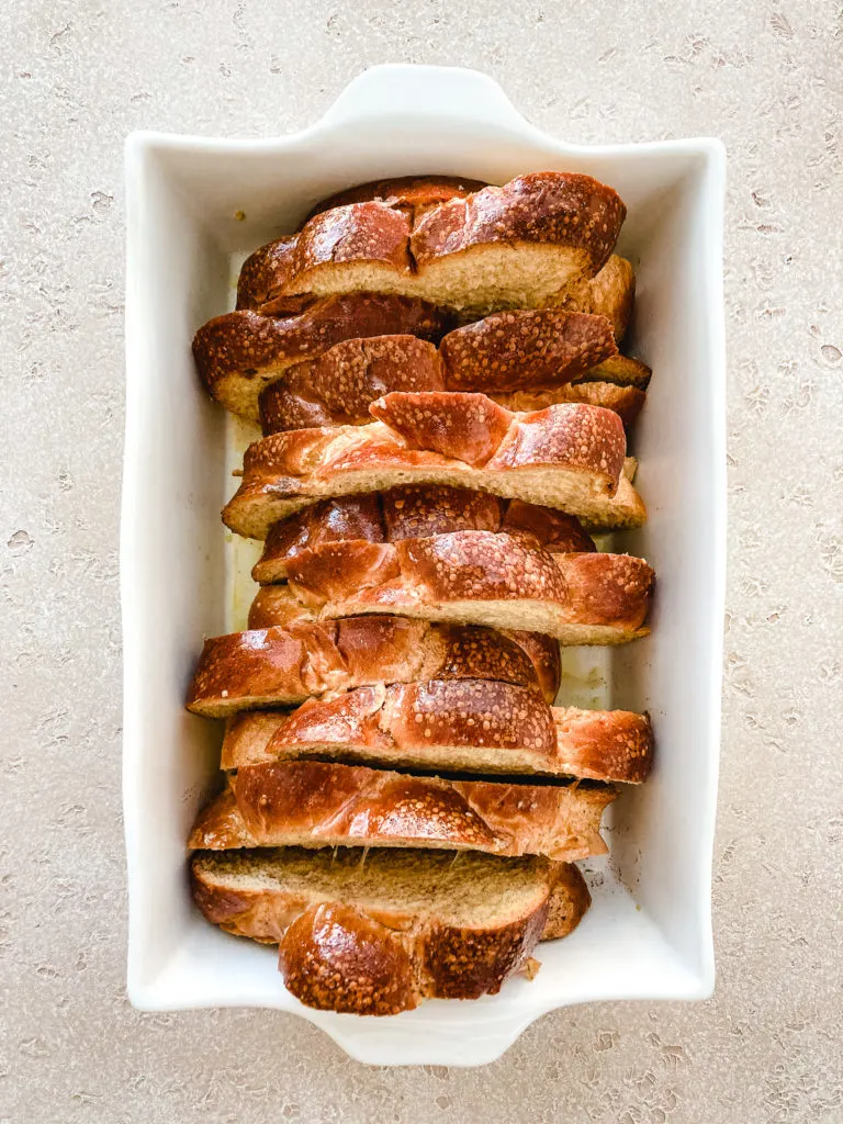 Unbaked french toast in a baking dish.