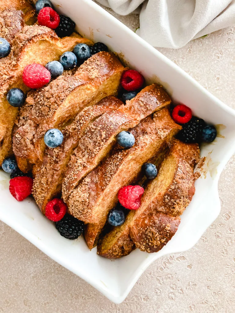 Top down view of oven baked toast in a baking dish.