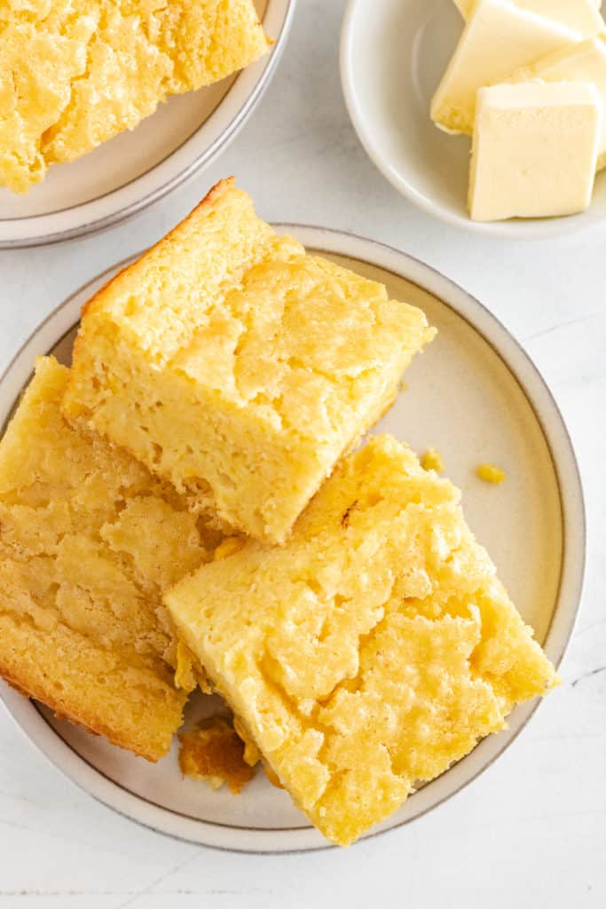 Top down view of a plate of cornbread.
