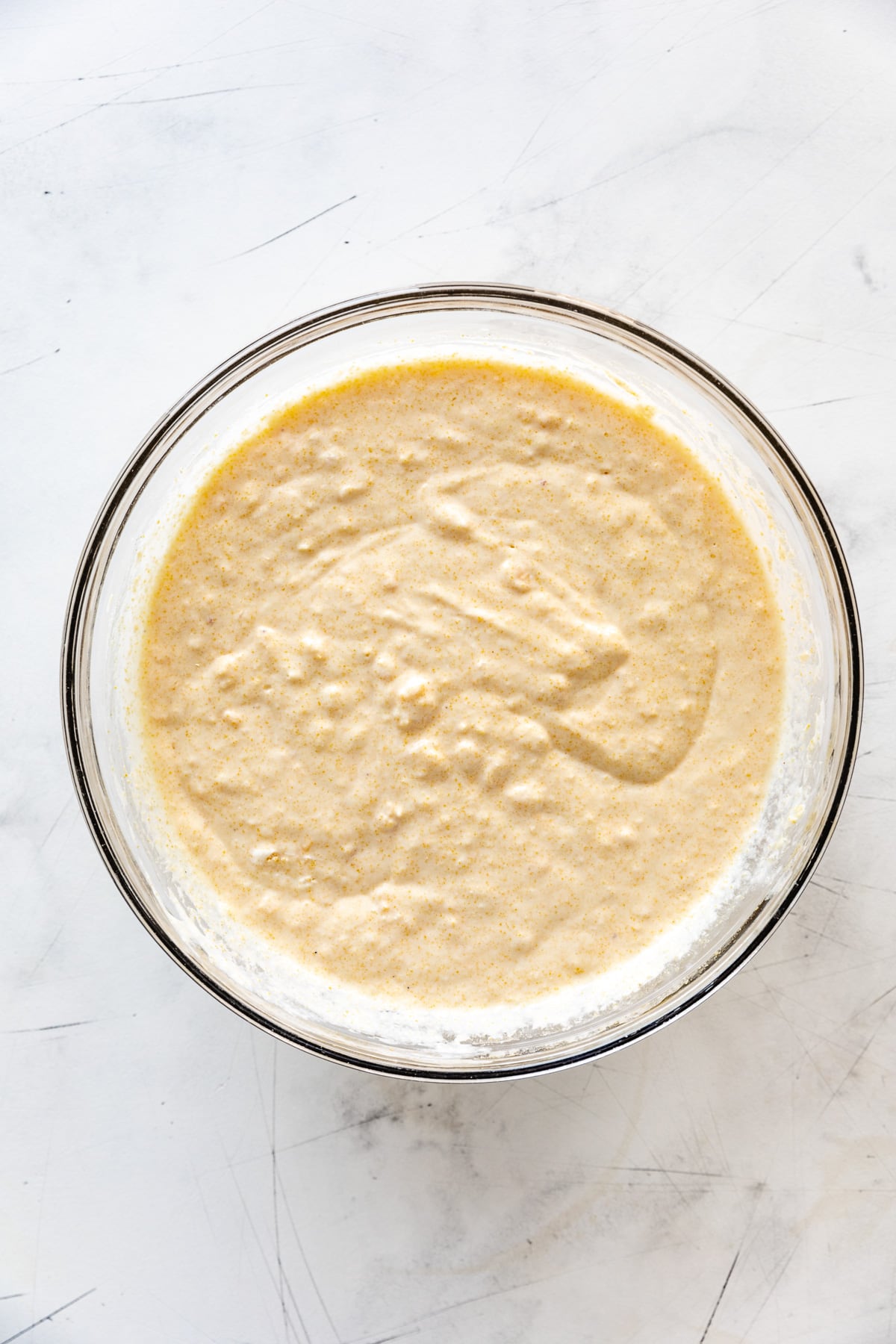 Cornbread batter in a bowl.