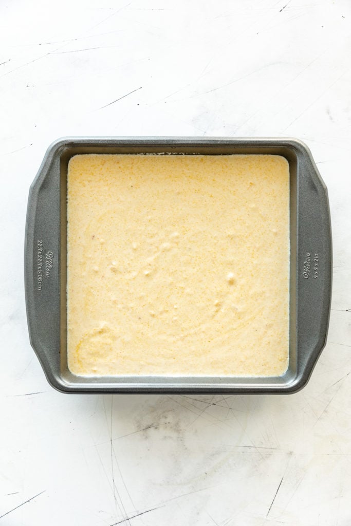Pan with unbaked cornmeal batter.