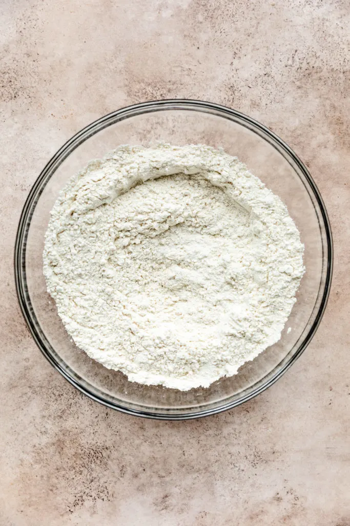 Flour whisked with baking powder and baking soda.