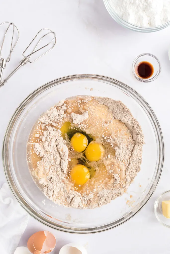 Cake mix, eggs, and oil in a bowl.