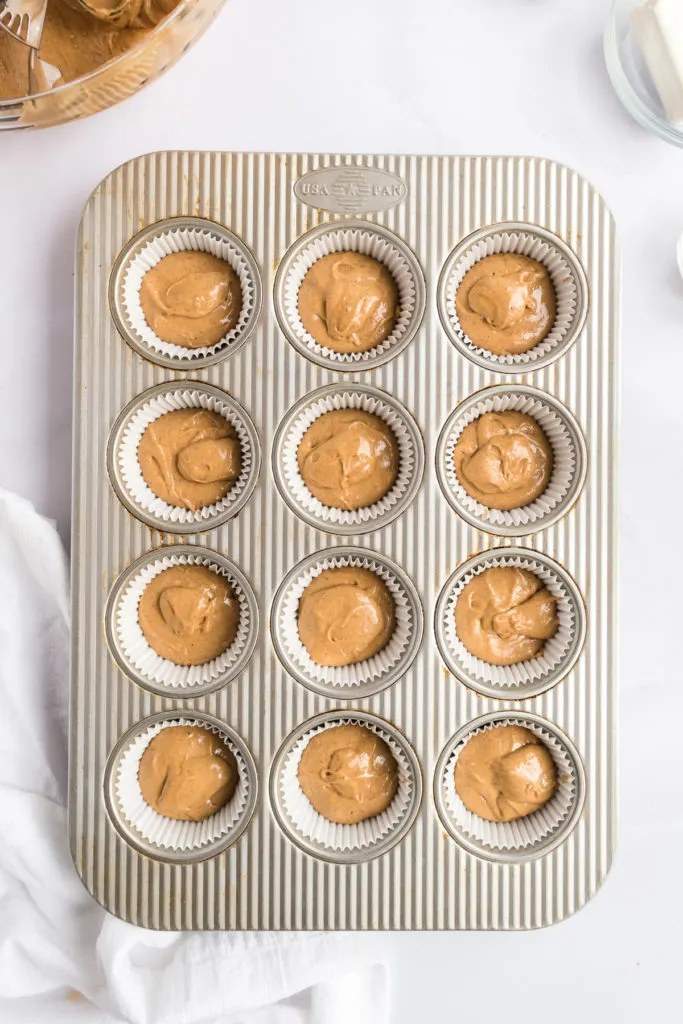 Cupcake batter in a pan.