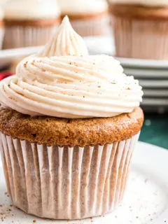 Close up view of a gingerbread cupcake on a plate.