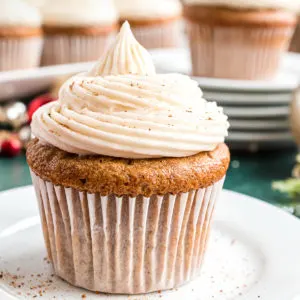 Close up view of a gingerbread cupcake on a plate.