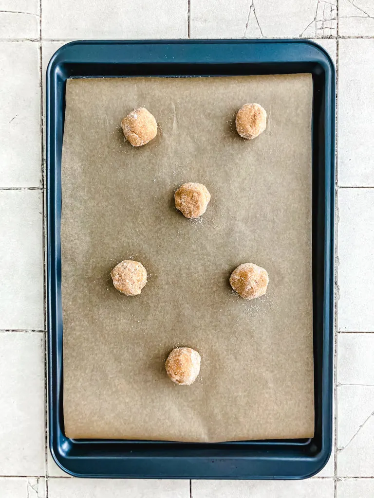 Cookie dough on baking sheet.