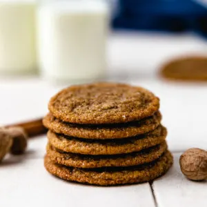 Close up view of a stack of molasses cookies.