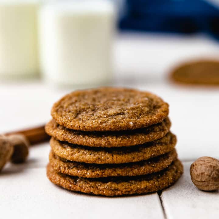 Close up view of a stack of molasses cookies.