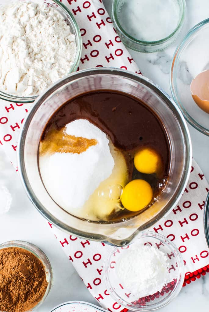 Sugar eggs and melted chocolate in a bowl.