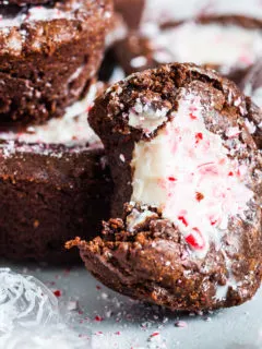 Bite taken out of a peppermint brownie muffin.