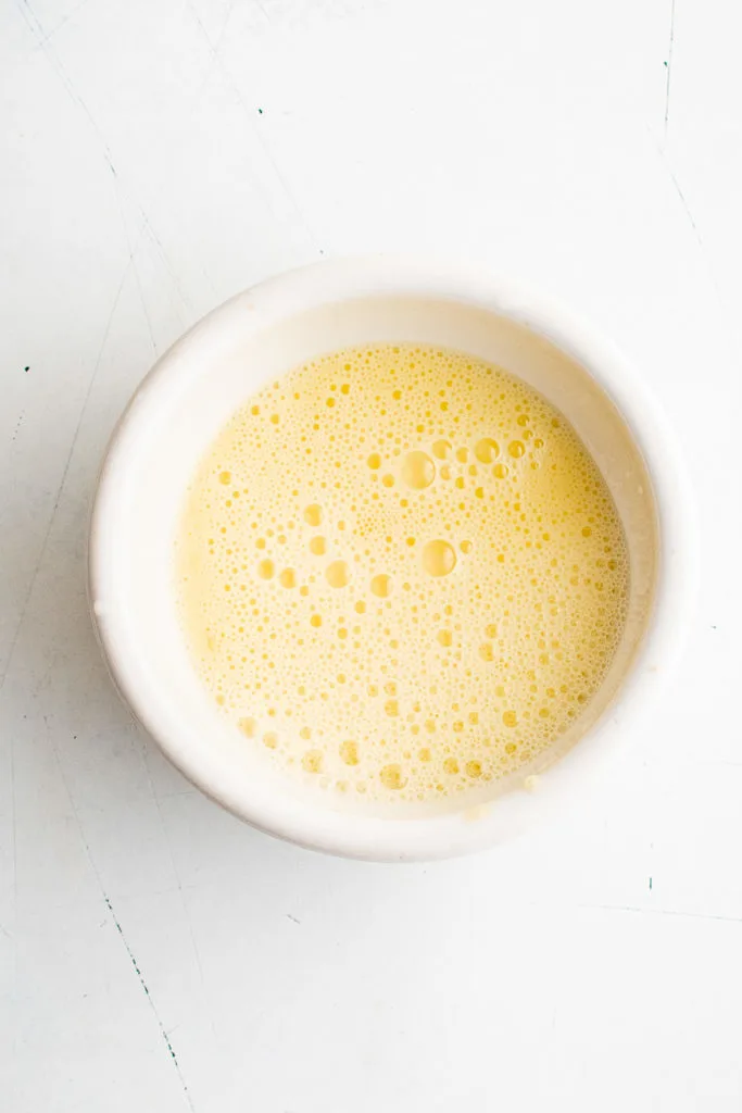 Egg wash in a bowl.