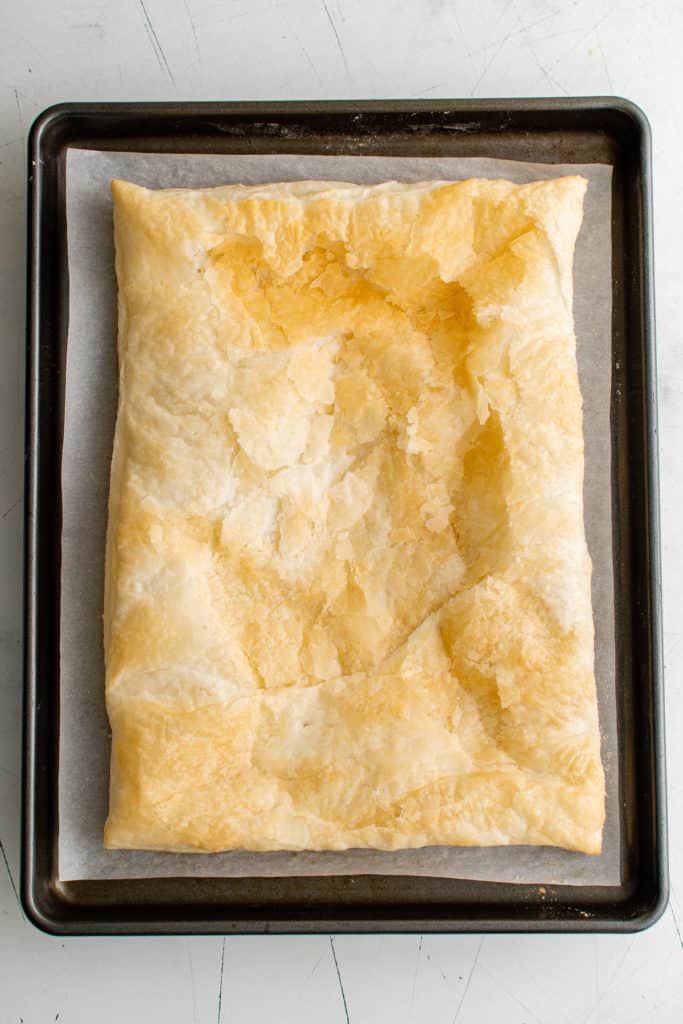 Baked puff pastry on a pan.