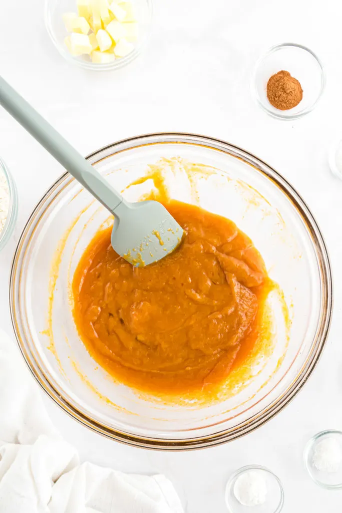 Wet muffin ingredients in a bowl.