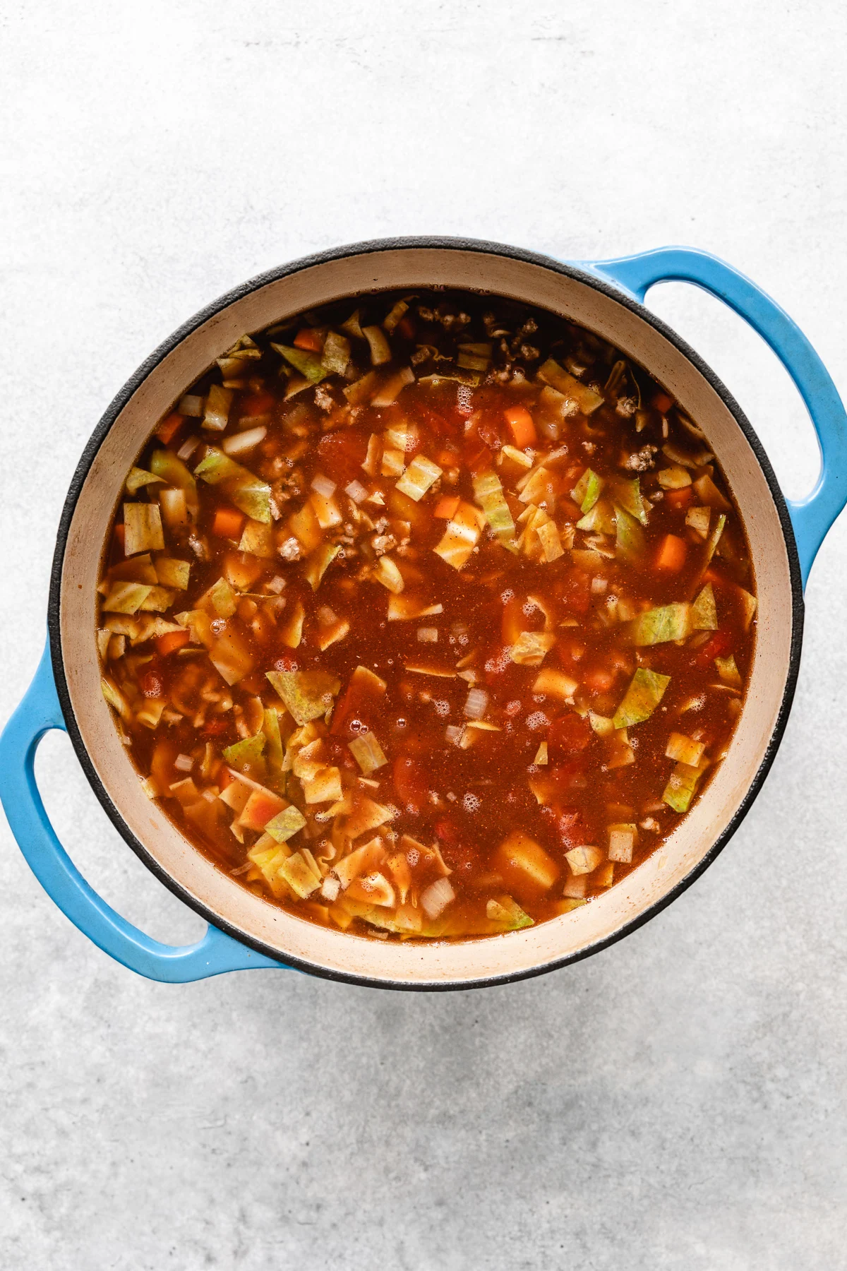 Chopped cabbage in broth.