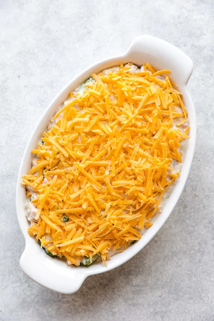 Shredded cheese sprinkled over casserole.